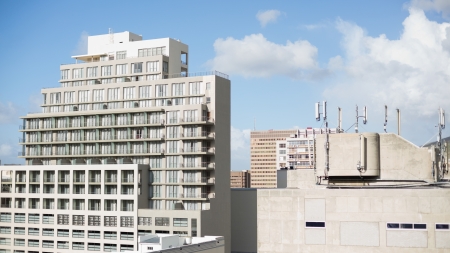 View of huge buildings under blue sky