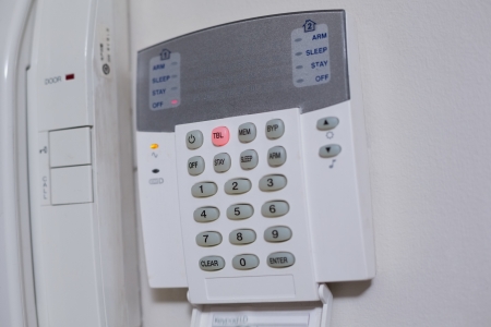 Close up of a white wall mounted entry phone system