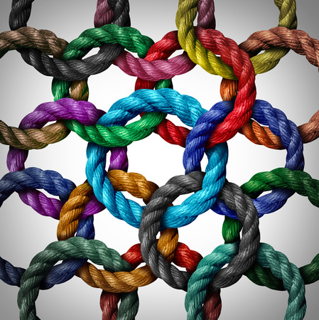 Central networking and network connection business concept as a group of diverse circle ropes connected to a central rope loop as a metaphor for connectivity and linking to a centralized support structure.