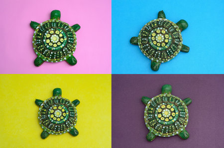 Set of ceramic turtles on a colorful background. top view. flat lay.の写真素材