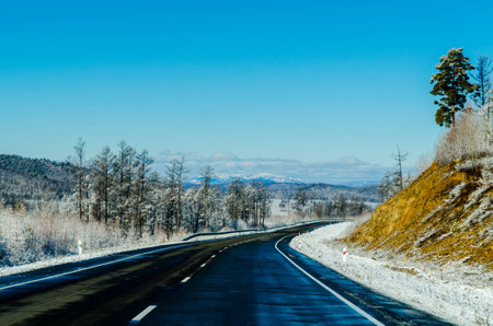 Winter road in Siberia. Russiaの写真素材