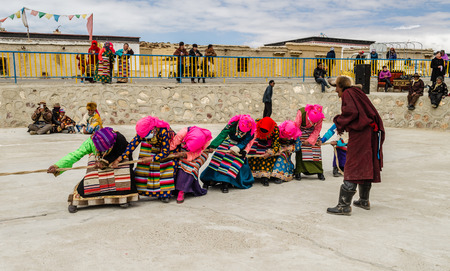 Tibetan women in traditional dress on holiday in the area of Lake Manasarovarのeditorial素材