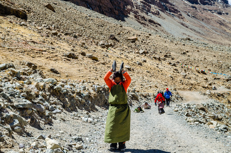 Tibetan woman commits bark around Mount Kailash. Tibetのeditorial素材