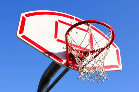 Basketball basket against the blue sky on the sideの写真素材