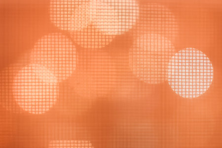 Abstract bokeh background, bokeh texture, defocused background, orange blurred backgroundの写真素材