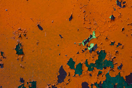 Texture of peeling orange paint macro