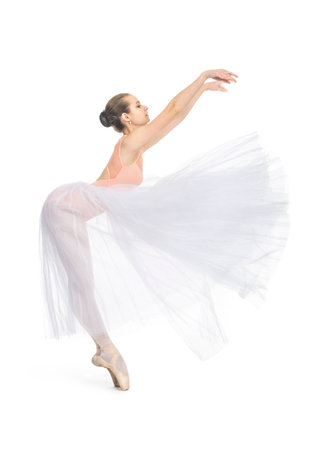 Young,smiling girl dancing the ballet. Studio shot of ballet on a white background. The isolated image.の写真素材