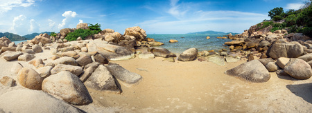 Panorama of the sea with rocks in the foreground - Hong Chong - in Nha Trang, Vietnam.の写真素材