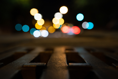 Bokeh background with traffic lights in the background. Sink in the foreground.