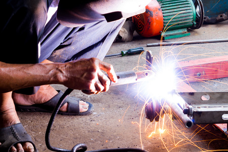 Action of welding metal by using electric spark.の写真素材