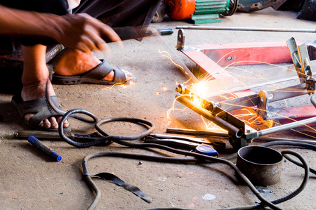 Action of welding metal by using electric spark.の写真素材