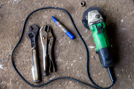 Technician equipment of wrength, glinder and marker pen.の写真素材