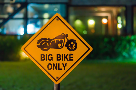 Yellow big bike sign for car parking