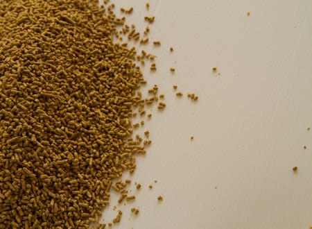 Pelleted Compound Feed for chicken Isolated on White Backgroundの写真素材