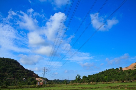 high voltage post High-voltage tower sky and mountain background の写真素材