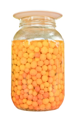 Preserves  Star Gooseberry in glass isolated on white background の写真素材