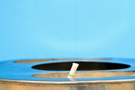 Detail of  Cigarette in sand ashtray binの写真素材