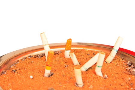 Detail of  Cigarette in sand ashtray binの写真素材