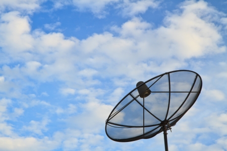 Satellite dish on sky backgroundの写真素材
