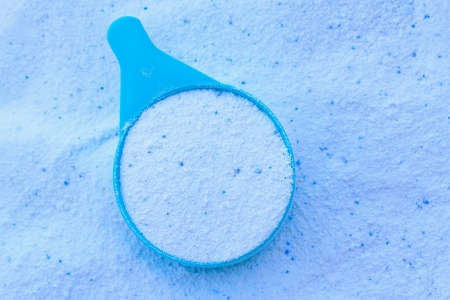 Laundry detergent powder for washing machine and plastic scoop for dosage の写真素材