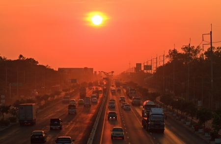 main road and cars against the sunsetのeditorial素材