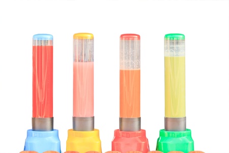 Various kinds juice in big glass tube  Isolated on white background