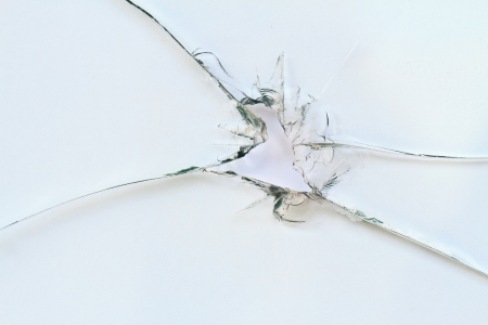 Broken window on white backgroundの写真素材