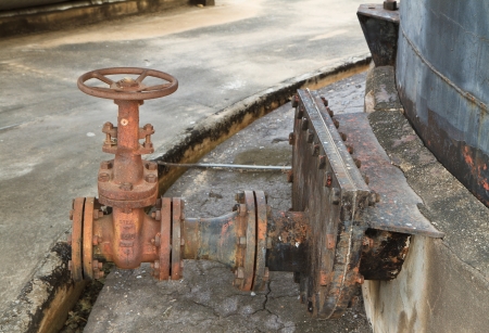 Old and rusty wheel of a control valveの写真素材