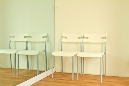 the modern white chairs interior design and white wall の写真素材