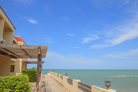 Hotel near beach and sea on blue sky backgroundのeditorial素材