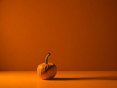 minimalist orange Pumpkin on orange backgrounds, Halloween design concept, AI Generatedの素材