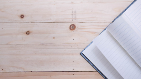 Face sketchbook on wood for background and textの写真素材