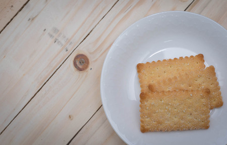 Cookies cracker on a white plate.の写真素材