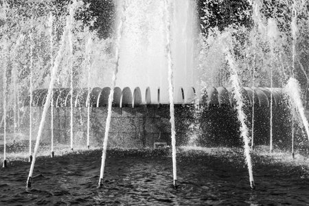 Beautiful water splashes of a fountain in the park.