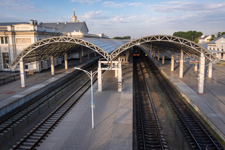 Brest city railway station with a view from above on the tracks in the early morning without people.