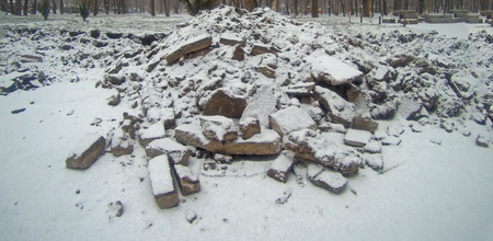 Pieces of broken asphalt covered with snow or ashes.. Photo for the post-apocalyptic theme.の写真素材