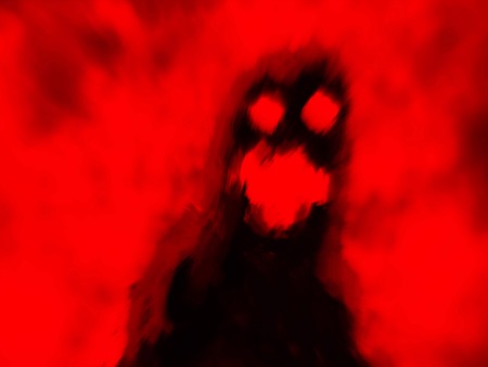 Devilry monster shadow on red background. Genre of horror.の写真素材