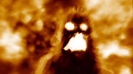 Hellish monster shadow on orange background. Genre of horror.の写真素材