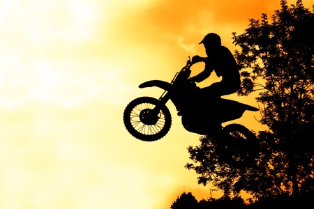 MX rider silhouette on fire skyのeditorial素材