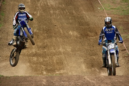 Unidentified racers in action at East European MX Championshipのeditorial素材