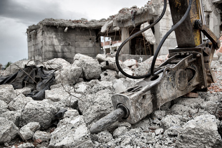 Demolition of old derelict buildings with jackhammer drilling machineの写真素材