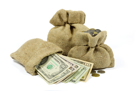 Jute Bags Full of Money Isolated on White Backgroundの写真素材