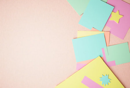Colorful sticky notes on pink background with copy space for text.の写真素材