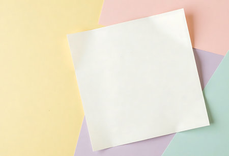 Blank white paper on colorful pastel background with copy space.の写真素材