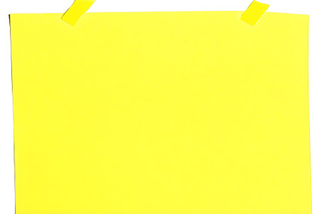 Yellow sheet of paper on a white background. Place for your text.
