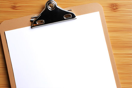 Clipboard with blank paper on wooden background. Copy space.の写真素材