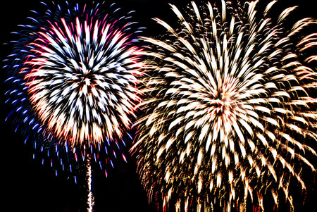 Colorful firework display for celebrating happy new year and merry christmasの写真素材