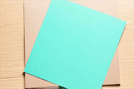 Stack of paper sheets on a wooden background. Copy space for text.の写真素材