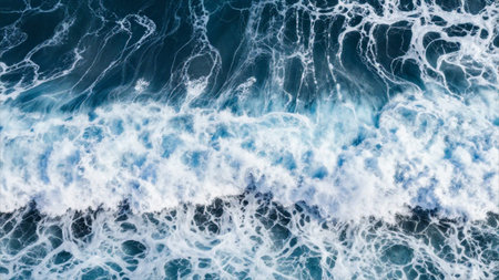 Blue ocean waves background. Top view of ocean wave with foam.