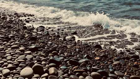 Pebble stones on the beach. Black sea. Toned.